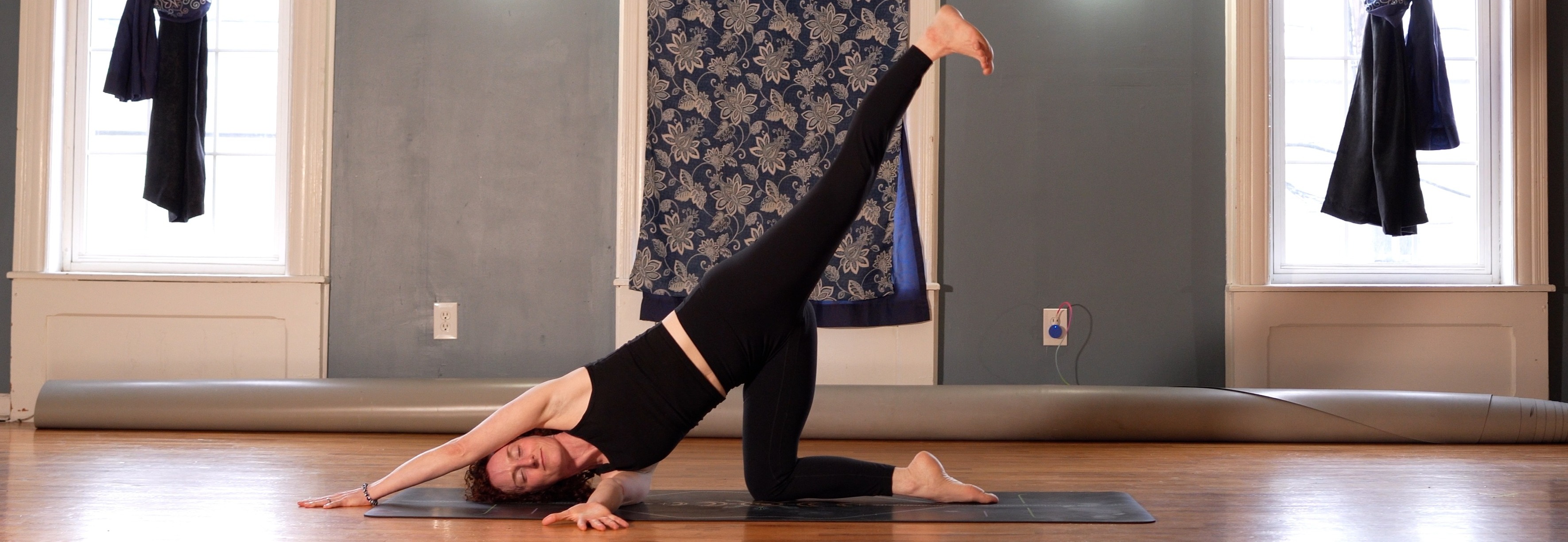 Katt Callan in Thread the Needle pose